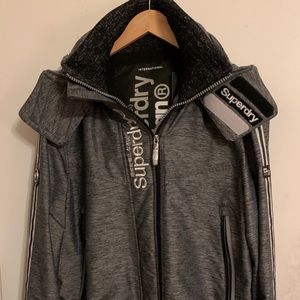 Men’s light/medium Superdry jacket.